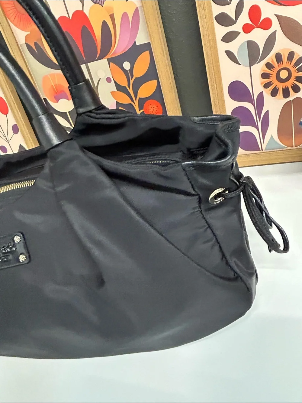 Kate Spade New York Stevie nylon slouchy hobo with leather trim. Large